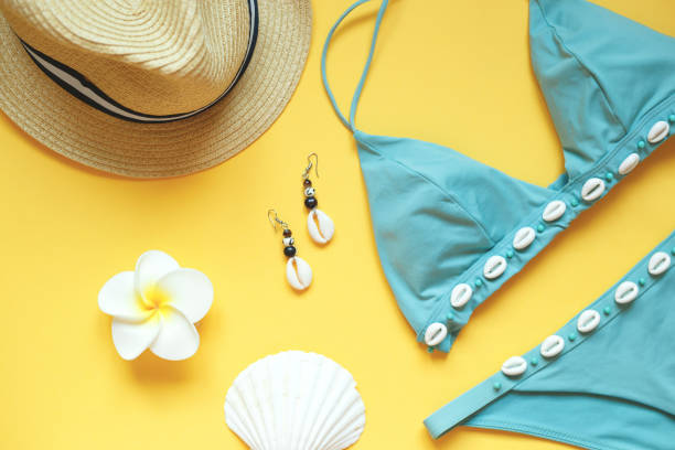 istock set of summer beach accessories on a yellow background 1270055105