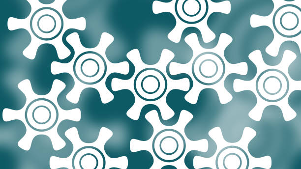 istock Closeup on slowly rotating white gears. 1270056800