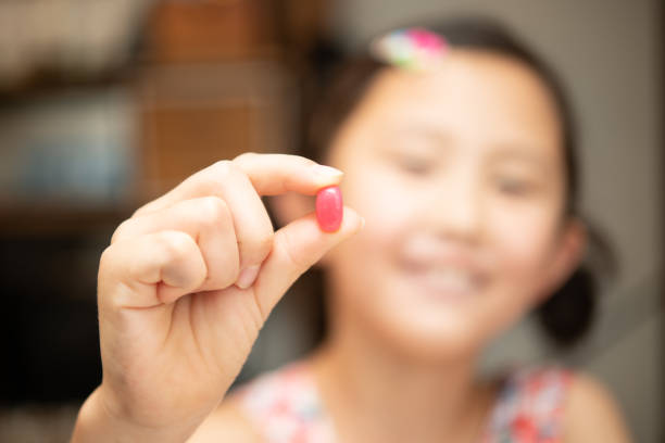 istock Girl with little candy 1270058198