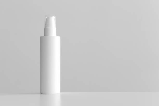istock White cosmetic lotion bottle mockup with blank copy space on a white table. 1270058317