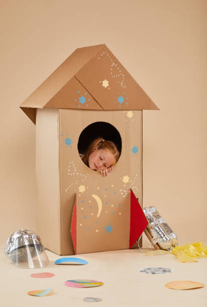 istock Little Girl Sleeping in Space Rocket 1270061007