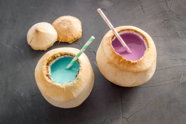 istock Drink in raw coconut with straw, top view 1270063061