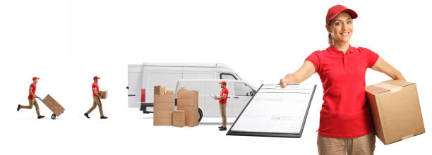 istock Delivery woman with a document and a clipboard and workers loading boxes in transport vans 1270065456