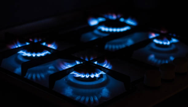 istock Burning gas hobs in the darkness 1270065762