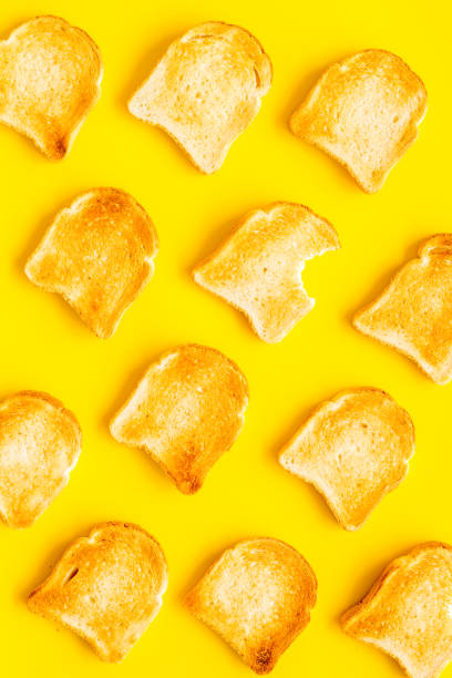 istock Slices of toast bread pattern. Food background. Top view 1270066922