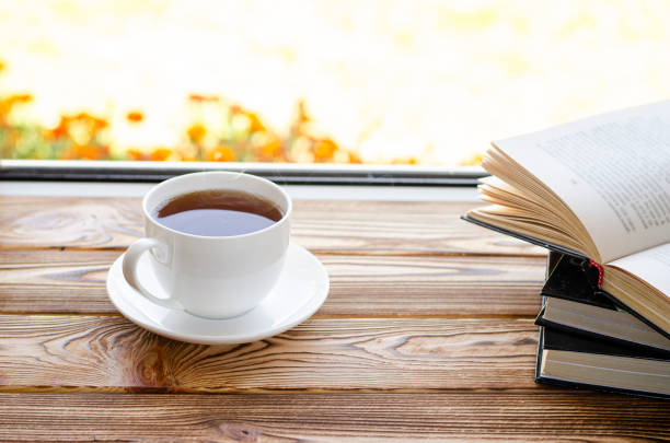 istock A cup of tea stands on a window sill against the window 1270068654