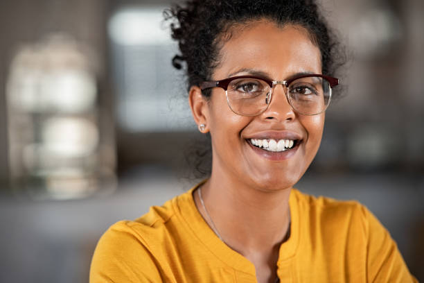istock Happy black woman looking at camera with eyeglasses 1270068769