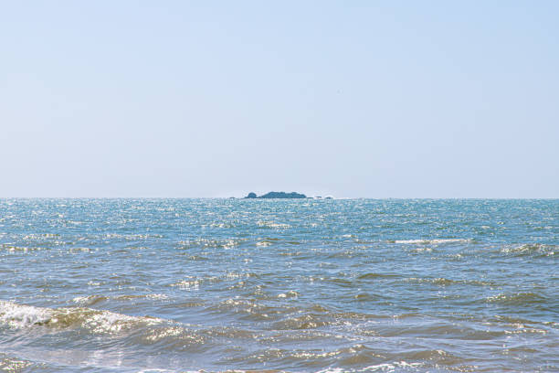 Landscape with ocean wave and rocks in goa india