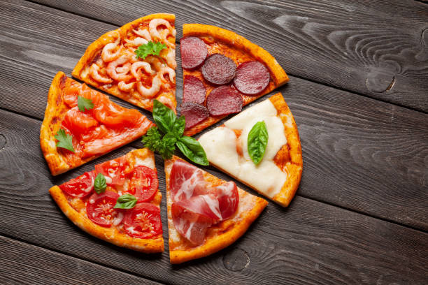 istock Tasty slices of different pizza 1270072412