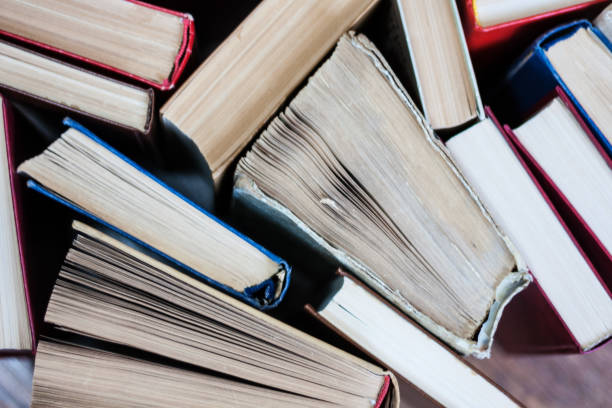 istock stack of old book, education concept background, many books piles with copy space for text 1270073970