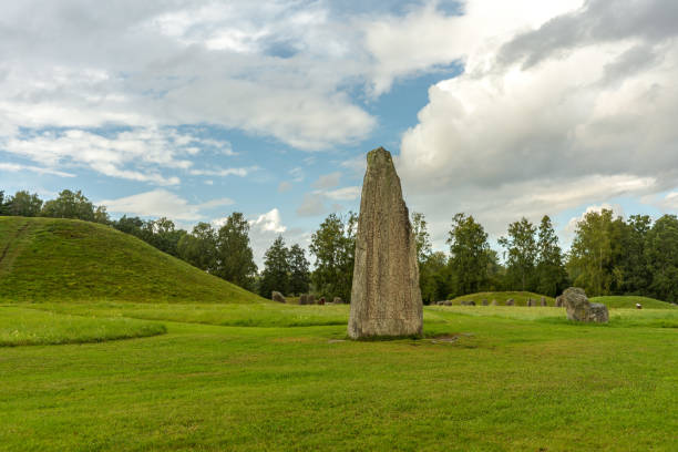 istock Tall rune stone at a burial ground in Sweden 1270075158