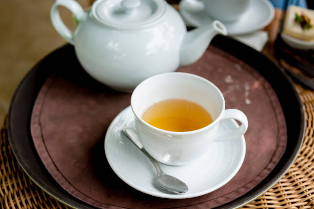 Soft focus. Hot Tea Cup on  wooden table