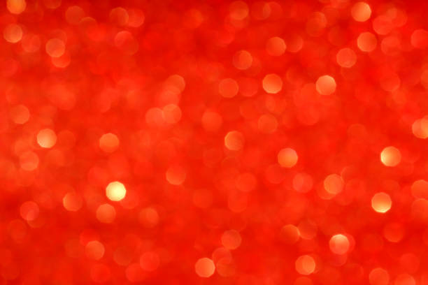 istock Defocused Golden lights. Abstract red bokeh texture background. 1270081700