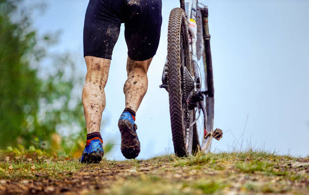 istock dirty feet male cyclist 1270081946