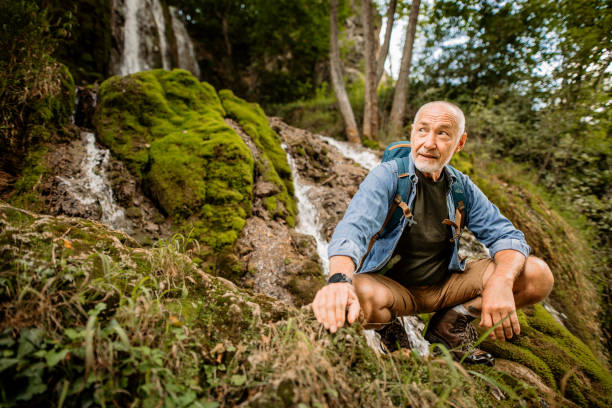 istock Senior Hiker trekking in mountain 1270084922
