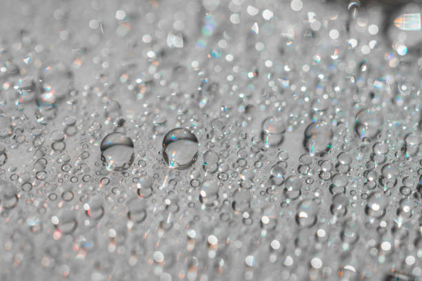 istock Macro photography of water drops on a mirror reflective surface 1270086517