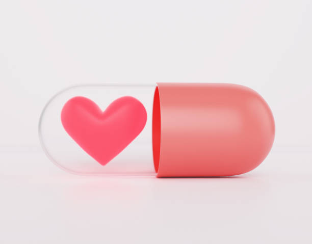 herz ist in der roten pille, aphrodisiakum für männer und frauen konzept, 3d render - pink pill stock-fotos und bilder