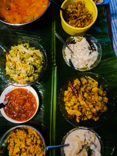 istock Onam special meals made with vegetables in separate vessels in an array. 1270088022