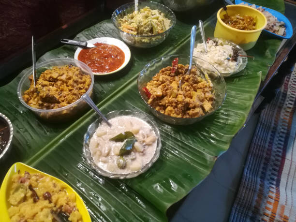 istock Onam special meals made with vegetables in separate vessels in an array. 1270088082