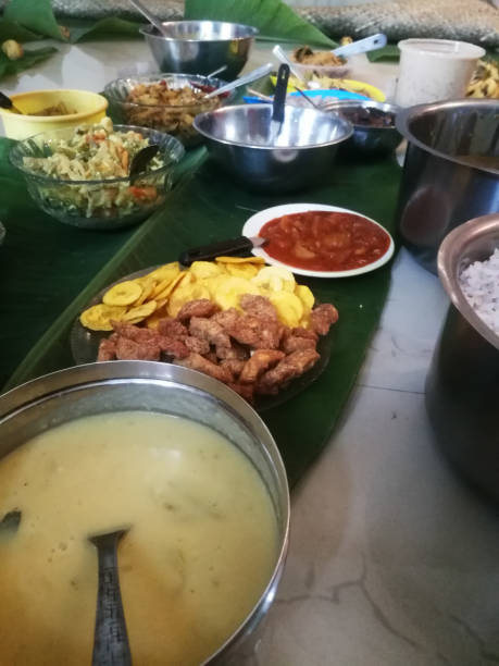 istock Onam special meals made with vegetables in separate vessels in an array. 1270088095