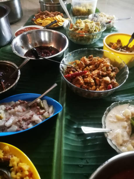 istock Onam special meals made with vegetables in separate vessels in an array. 1270088110