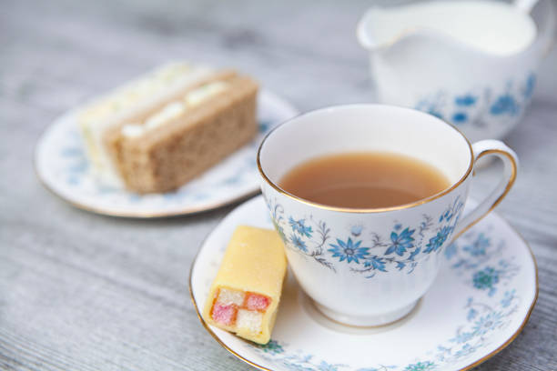 istock Afternoon tea with Battenburg cake and sandwiches 1270088113