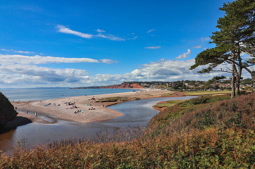 A landscape photograph of Budleigh Salterton beach in Devon.