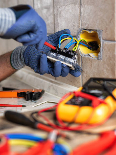 istock Electrician at work with safety equipment on a residential electrical system. Electricity. 1270091233