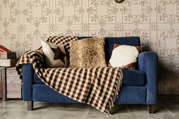 istock old vintage sofa with beautiful nice pillows and fur 1270091286