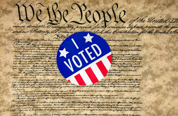 istock Voting sticker on United States Consitution 1270091350