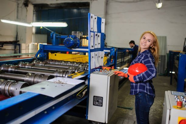 istock woman in red safety helmet work as industrial worker 1270093626
