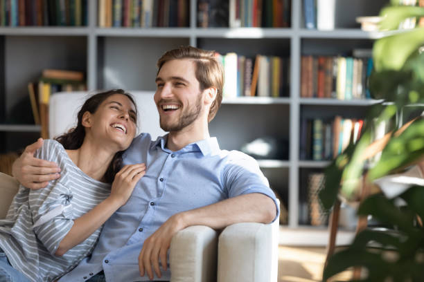 istock Overjoyed young couple having fun at home. 1270093723