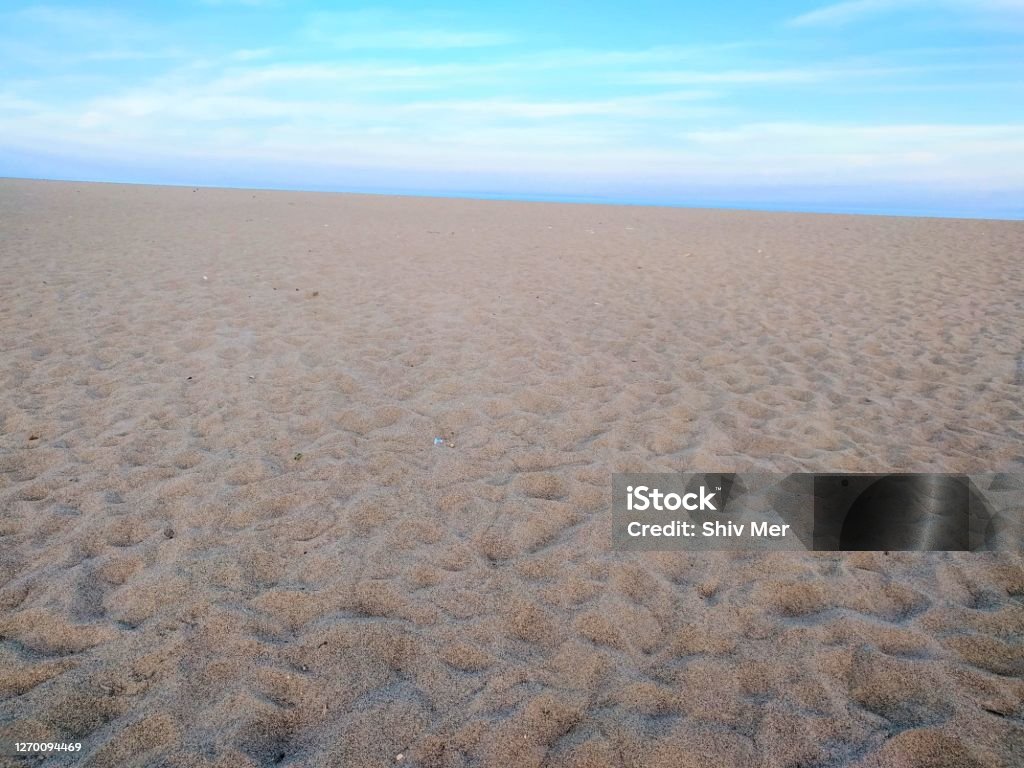 Cloudy sky above sea at beach in Hathab in Bhavnagar, Gujarat, India Above Stock Photo