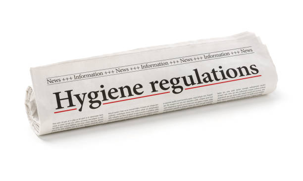 istock Rolled newspaper with the headline Hygiene regulations 1270095931