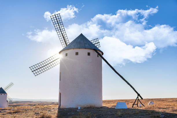 istock Old spanish windmills on a sunny day with clouds, Campo de Criptana, Spain 1270098159