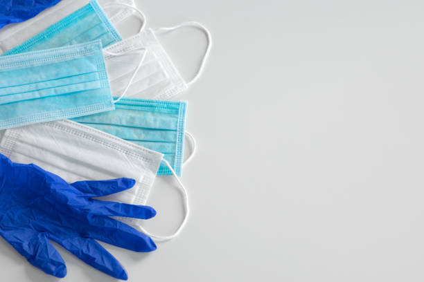 istock Blue medical disposable face mask and gloves 1270101274