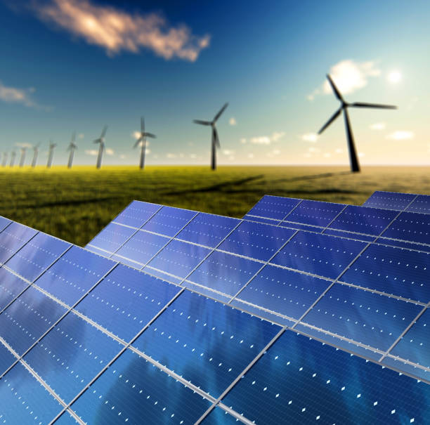 istock Renewable energy, modern solar panels and wind turbines 1270103831
