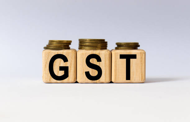 istock cubes with the word GST on them. Care concept. 1270104894