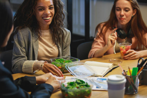 istock Time for chatting with the office colleagues while having healthy food 1270108578