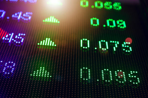 istock Reflection of stock readings in window 1270109562