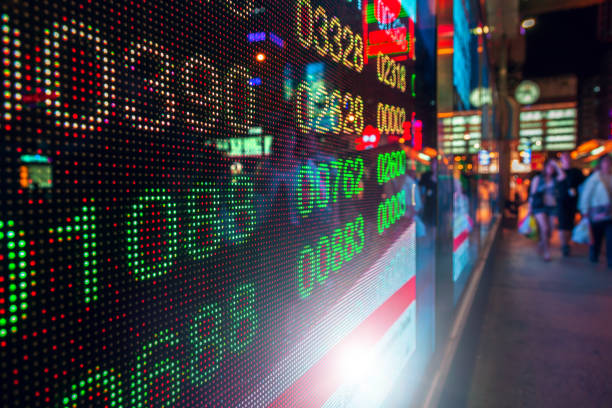 istock Reflection of stock readings in window 1270109596
