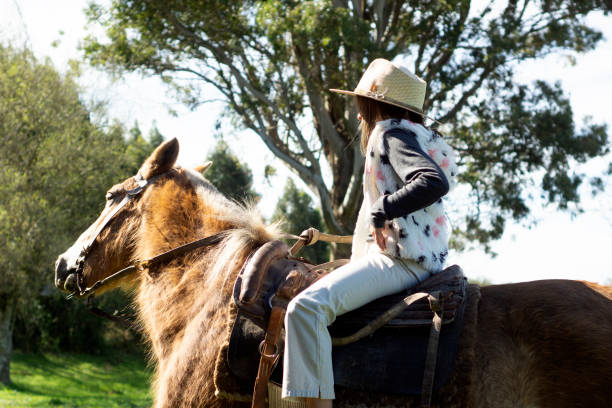 istock girls on horseback 1270110866