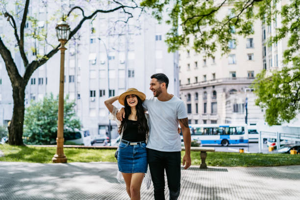 istock Young couple walking in park 1270118495