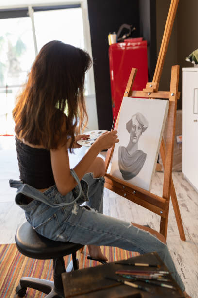 istock Fine art students painting portrait 1270118618