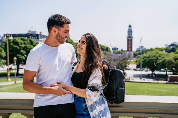 istock Young beautiful smiling couple in park 1270118645