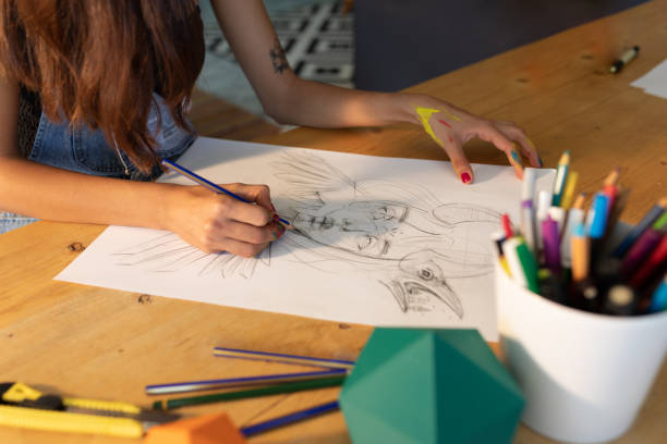 istock Young artist drawing fantastic portrait 1270118646