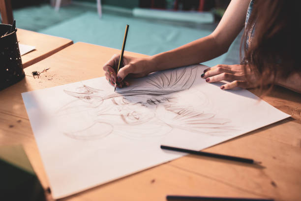 istock Young artist drawing fantastic portrait 1270118842