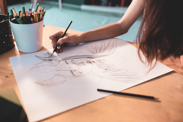 istock Young artist drawing fantastic portrait 1270119421