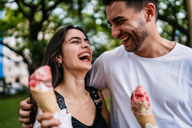 istock Happy couple eating ice cream 1270119463