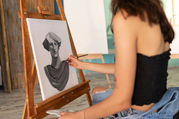 istock Fine art students painting portrait 1270119572
